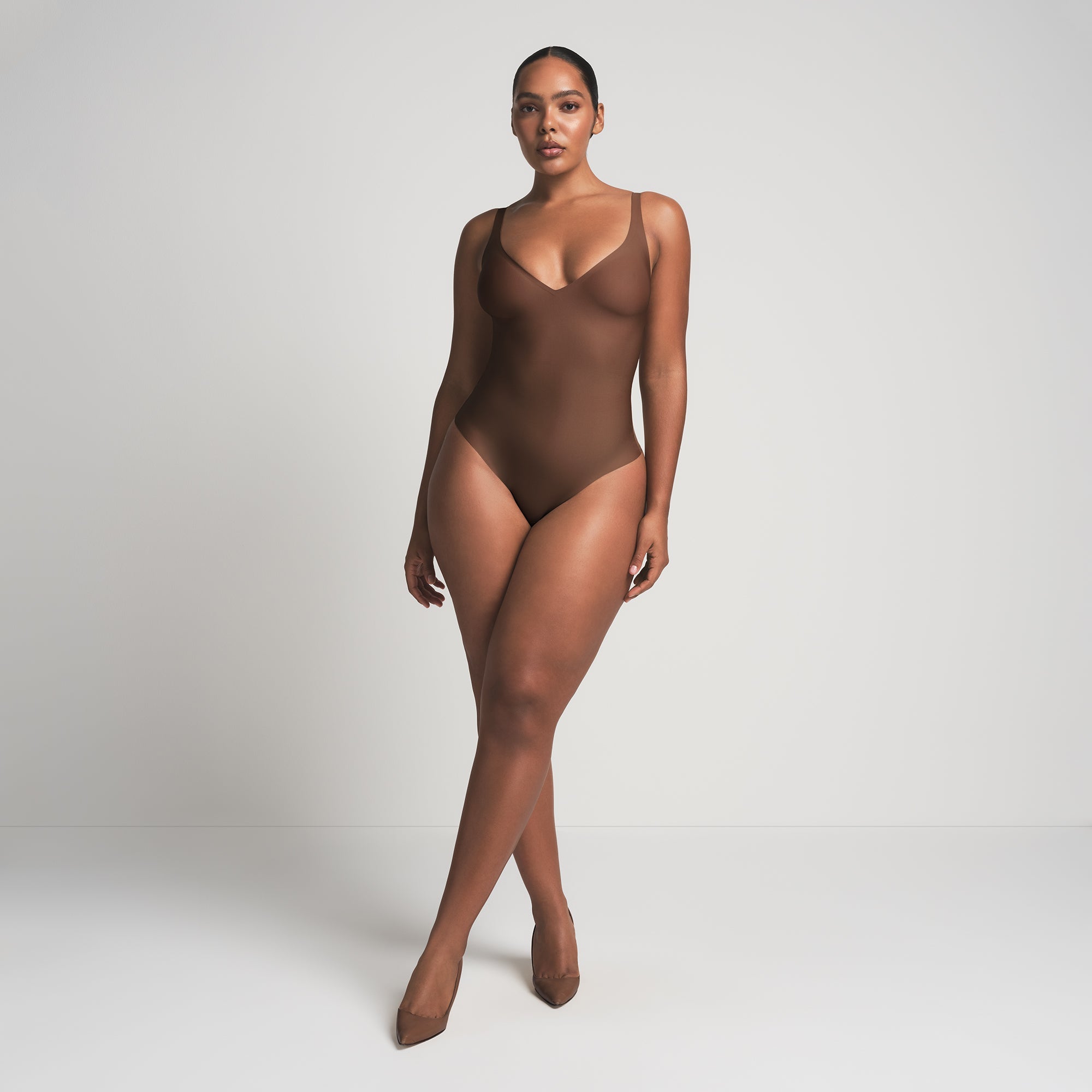 SKIMS BODY UNLINED PLUNGE THONG BODYSUIT | JASPER
